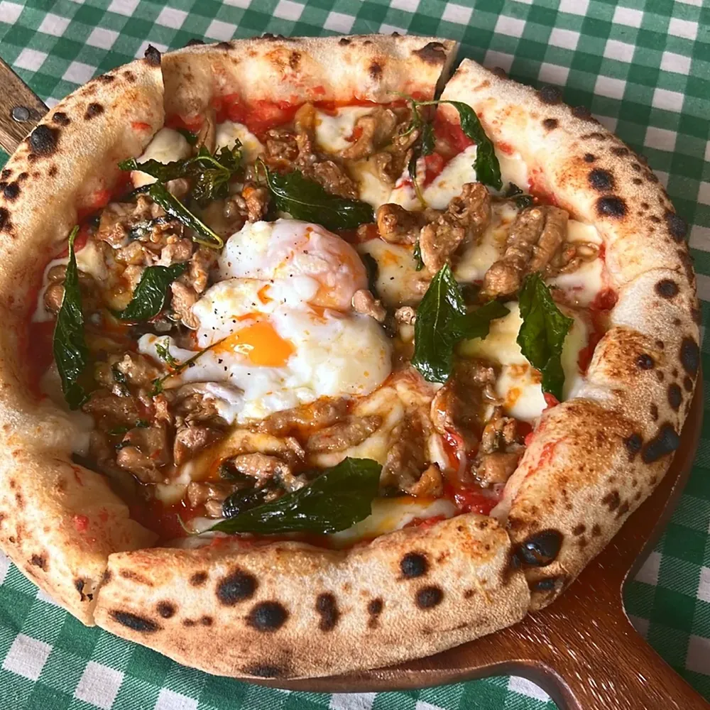 Egg and basil pizza